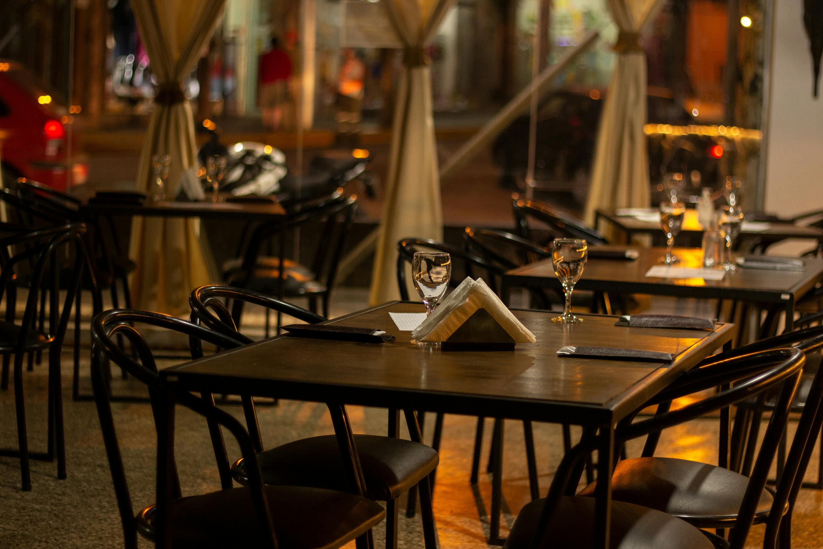 Empty restaurant table set for dinner